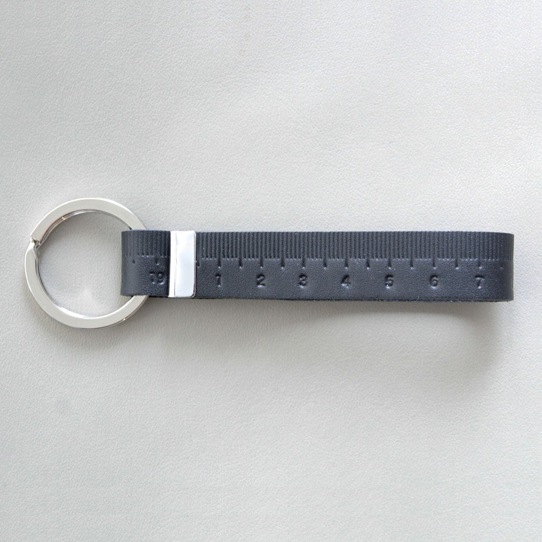 Tape measure key holder